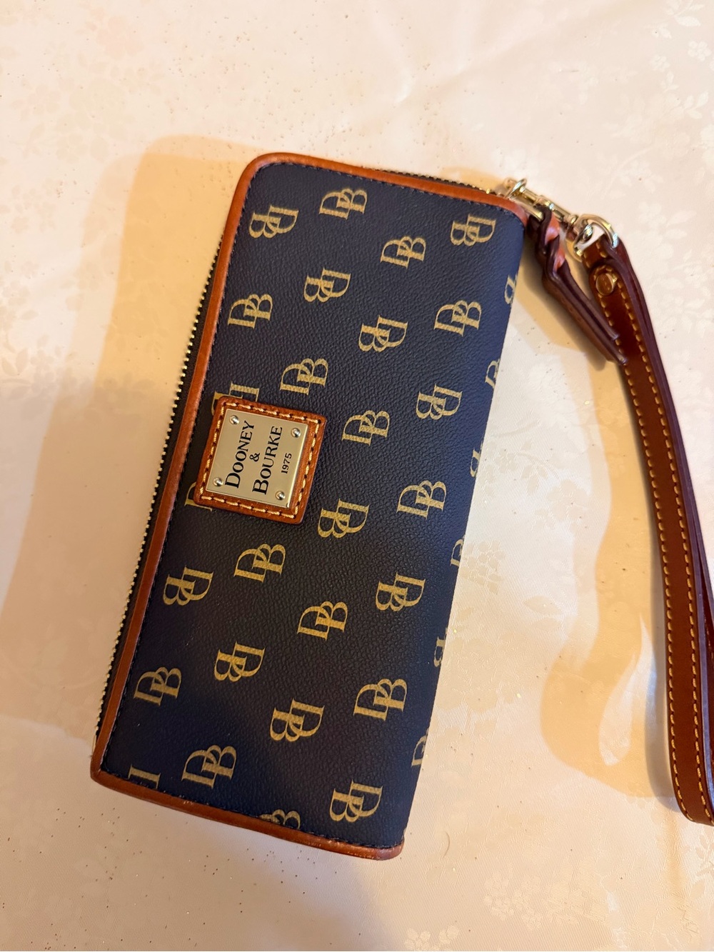 Dooney & Bourke Brown and Tan Signature Zip Wristlet with Logo Pattern
